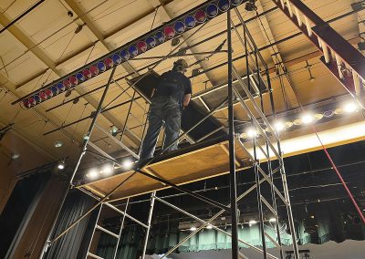 Sprinkler Fitter Foreman setting up scaffolding